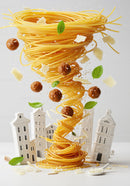 Spiral of spaghetti with meatballs and basil leaves