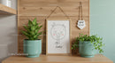 Cute Elephant Pinby Wall Art with Indoor Potted Plants and Wooden Decor
