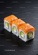 Fresh salmon sushi rolls with avocado and cream cheese