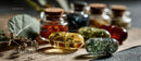 Herbal Capsules and Remedies with Green and Yellow Accents on Wooden Surface