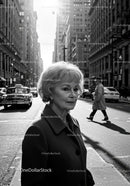 Senior Woman Standing on City Street in Black and White