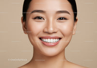 Close up of smiling young woman with flawless skin