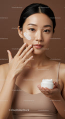 Young Asian Woman Applying Cream for Skincare Routine with Natural Makeup