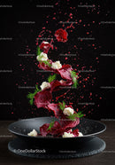 Fresh beetroot chips with cheese and dill on black plate