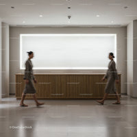 Blurred motion of woman walking in minimalist lobby