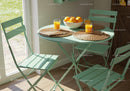 Cozy breakfast setting with oranges and juice on blue table
