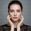 Close-up Portrait of a Young Woman with Blue Eyes and Natural Makeup