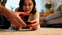 Woman receiving a diamond ring proposal at home