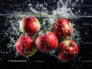 Fresh Red Apples Splashing in Water with Dynamic Motion
