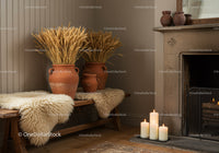 Cozy rustic interior with candles and dried wheat decor
