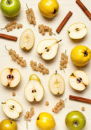 Assorted fresh pears and apples with white currants and cinnamon
