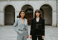 Stylish Business Women Walking Outdoors in City Environment