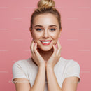 Young Woman Smiling with Clear Skin and Bright Blue Eyes