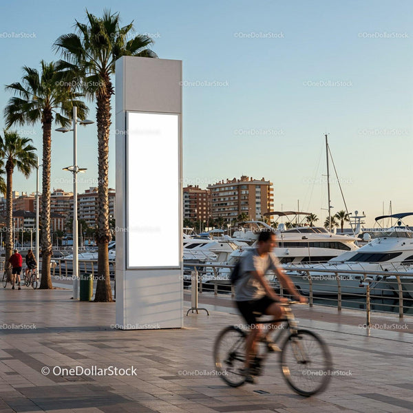 Sunny Marina Promenade with Cyclist and Blank Billboard JPG Mockup Image