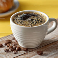 Freshly Brewed Coffee in a White Mug on Wooden Table