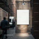 Blank white poster on urban alley wall at night