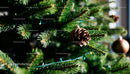 Pinecone Ornament Hanging on Festive Christmas Tree