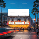 Evening street scene with vintage theater marquee lights
