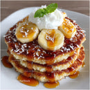 Banana and Caramel Stack with Whipped Cream and Mint Leaf