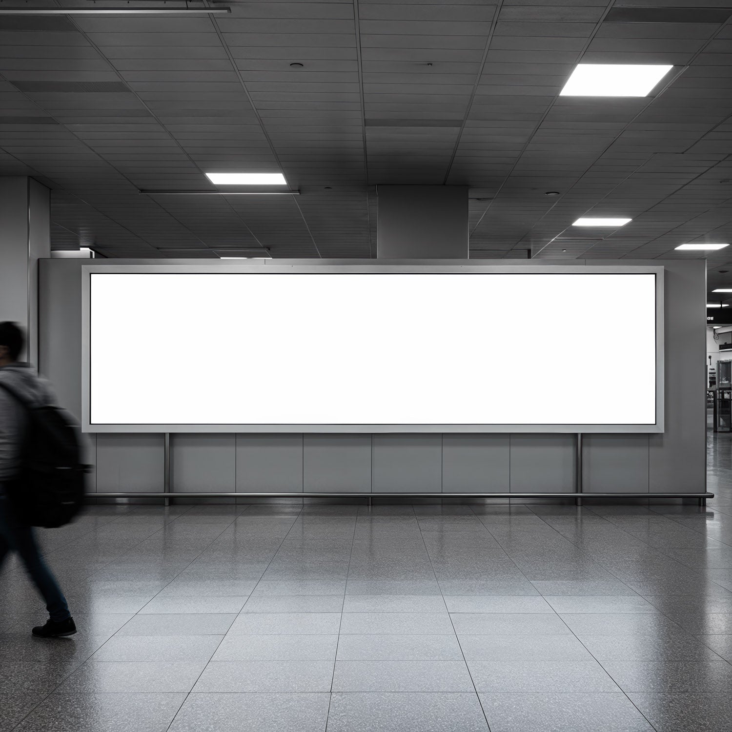Pusty, oświetlony billboard w nowoczesnej przestrzeni wewnętrznej