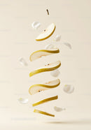 Floating Slices of Pear with White Petals on Soft Background