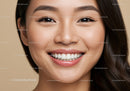 Close-up of young woman with radiant smile