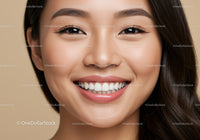 Close-up of young woman with radiant smile