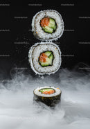 Fresh sushi rolls with salmon and cucumber on black