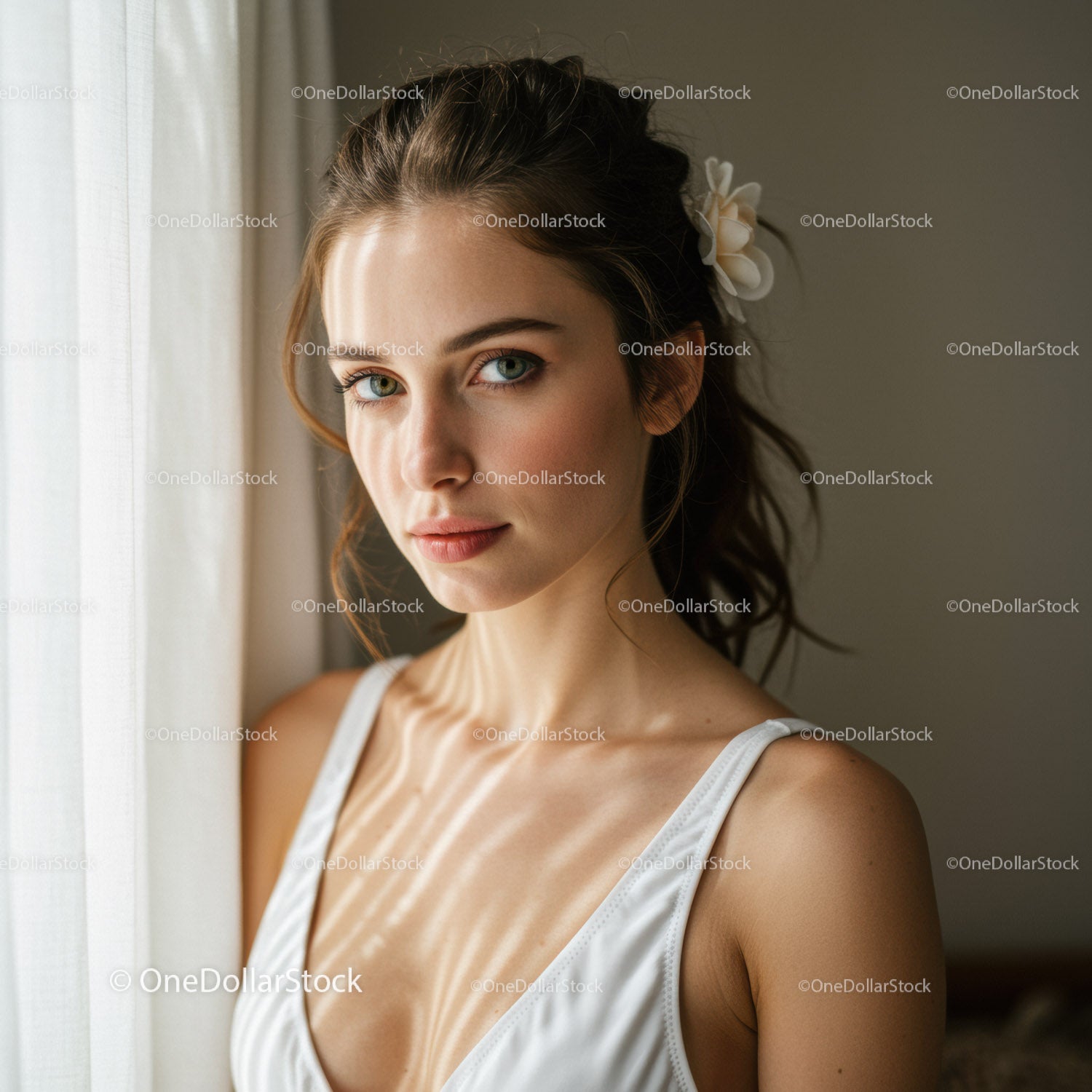 Elegant Woman Portrait with Blue Eyes and Floral Hair Accessory