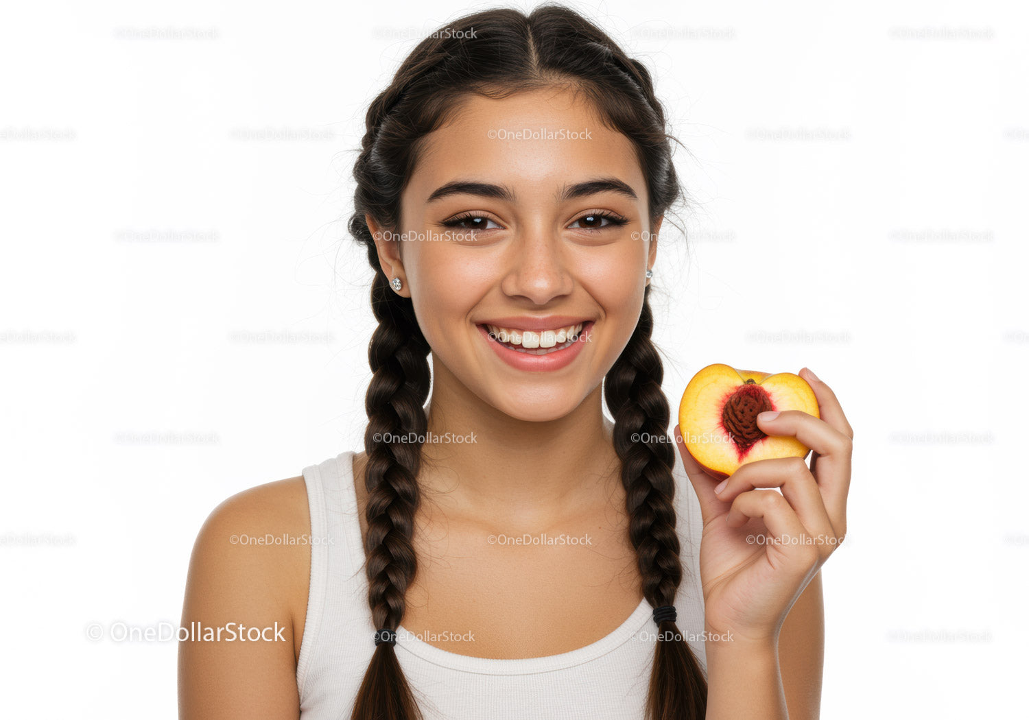 Young Woman with Braided Hair Holding Fresh Peach