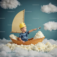 Child Sailing in Whipped Cream Sea with Waffle Boat