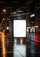 Empty Bus Stop Illuminated in Night City with Wet Pavement Reflections