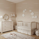 Cozy Baby Nursery with Cloud Wall Art and Plush Toys