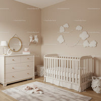 Cozy Baby Nursery with Cloud Wall Art and Plush Toys