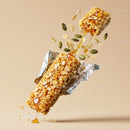 Nutty granola bar dripping with golden honey