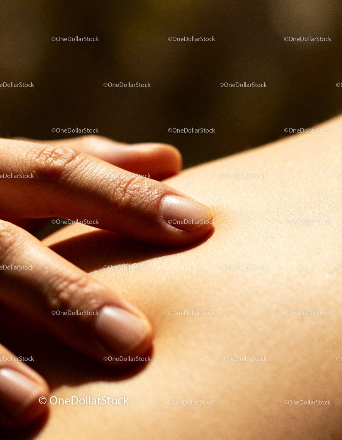 Close up of gentle hand touching smooth skin