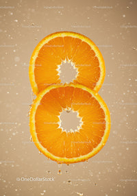 Fresh orange slices with water droplets on beige background