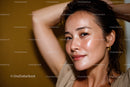Close-up of Confident Woman with Glowing Skin and Bright Smile