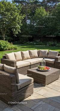 Comfortable Wicker Patio Set in Lush Garden with Fruit and Relaxing Atmosphere