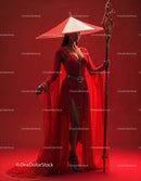 Elegant Woman in Red Dress with Accessories Against Red Background