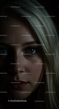 Closeup of thoughtful woman with dark moody lighting
