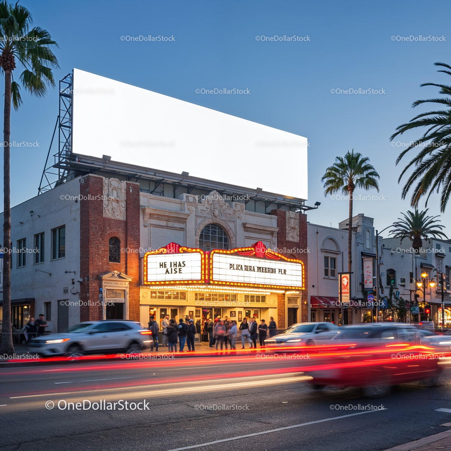 Historic Theater with Bright Marquee and Evening Traffic