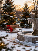Cozy winter park bench near frozen fountain at sunset