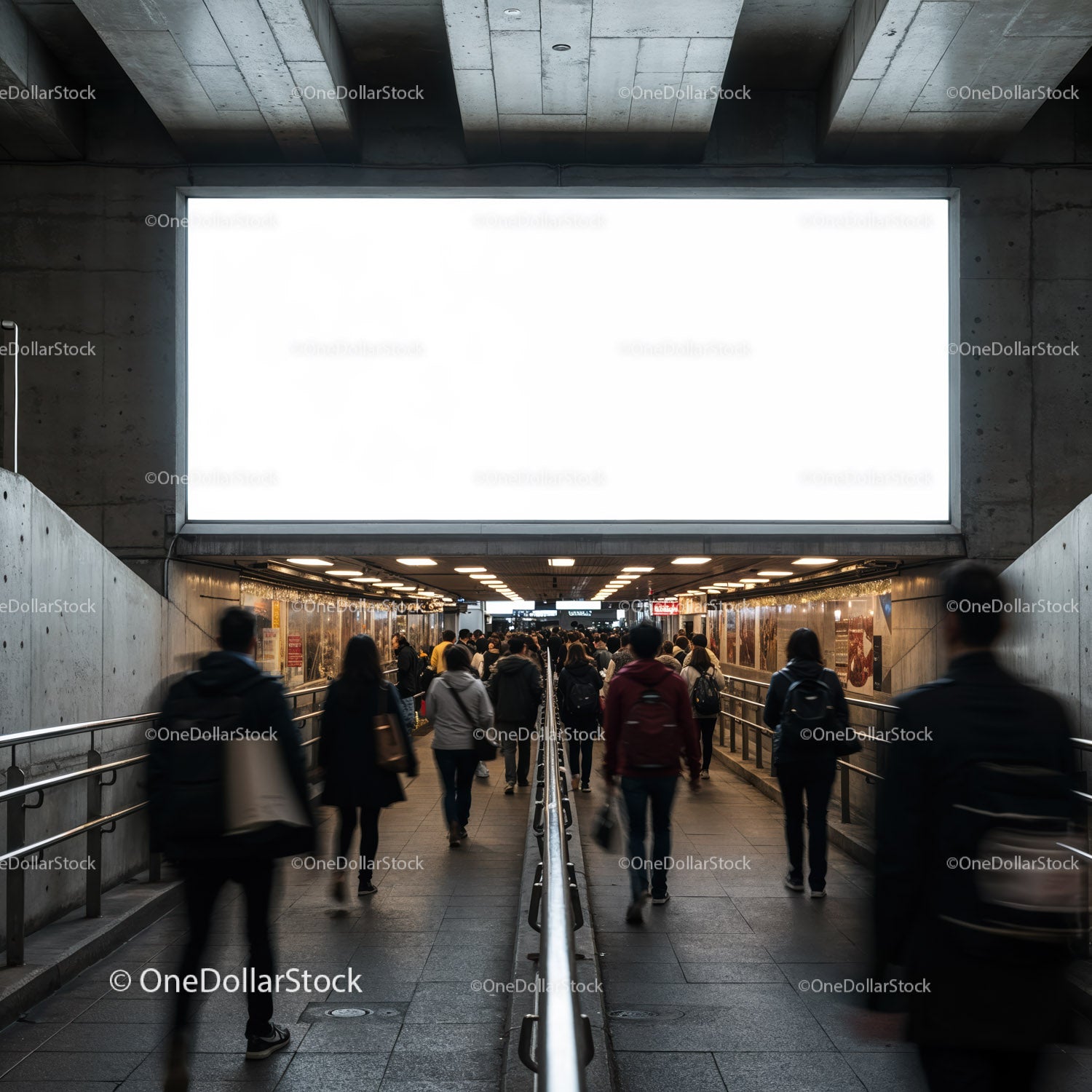 Commuters walking through urban underground passageway
