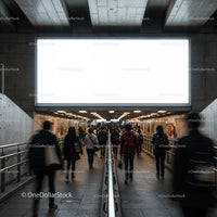 Commuters walking through urban underground passageway