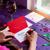 Handwriting a Loving Valentine Card by the Window