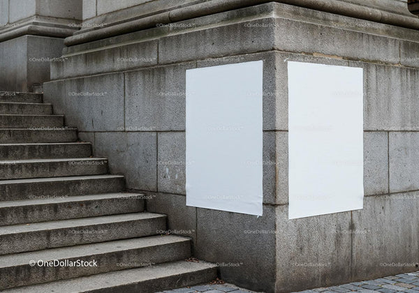 Blank white posters on aged stone building corner JPG Mockup Image