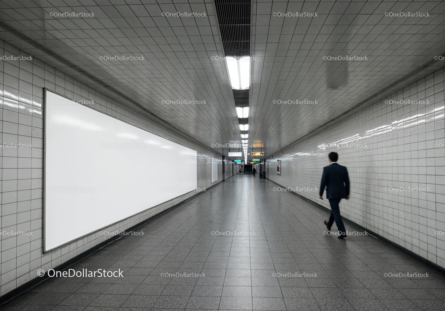 Modern Subway Tunnel with Tiled Walls and Fluorescent Lighting