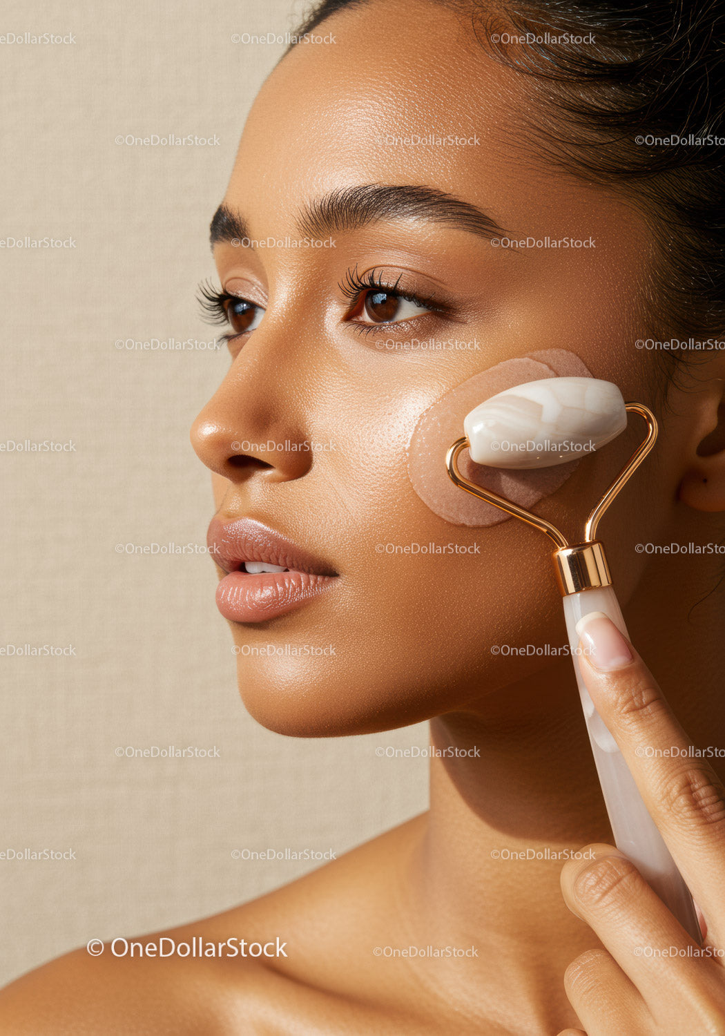Woman Using Jade Roller for Facial Skin Rejuvenation and Glow