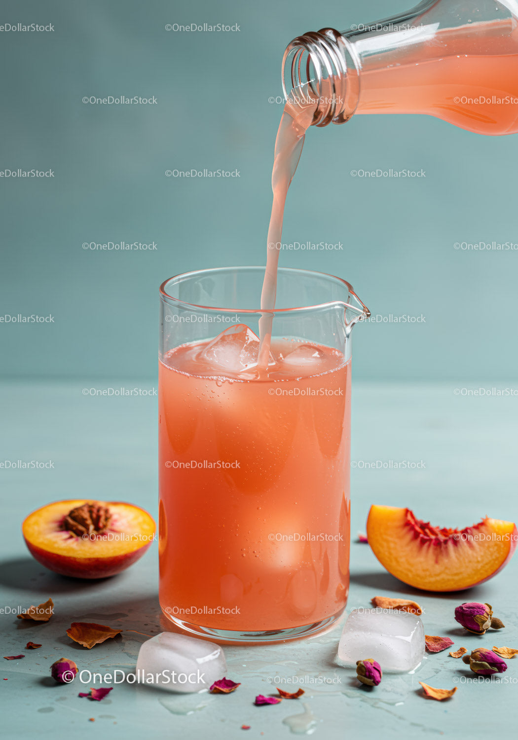 Refreshing Peach Juice Poured Over Ice in Glass Pitcher